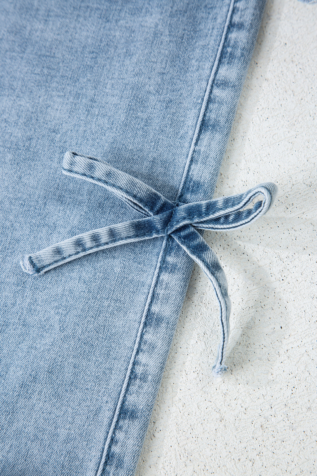 WHITE BOW KNOW DENIM